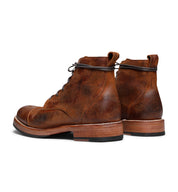 A pair of brown leather Santa Rosa Brand Larry boots from the Santa Rosa collection against a white background.