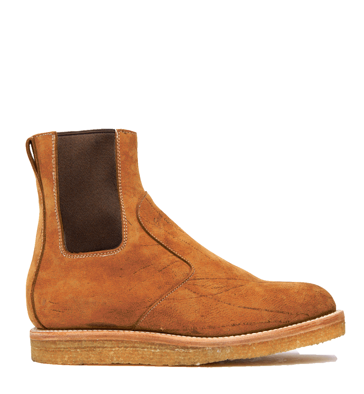 Brown suede Santa Rosa Brand Stamford Boot on a green background.