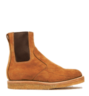Brown suede Santa Rosa Brand Stamford Boot on a green background.
