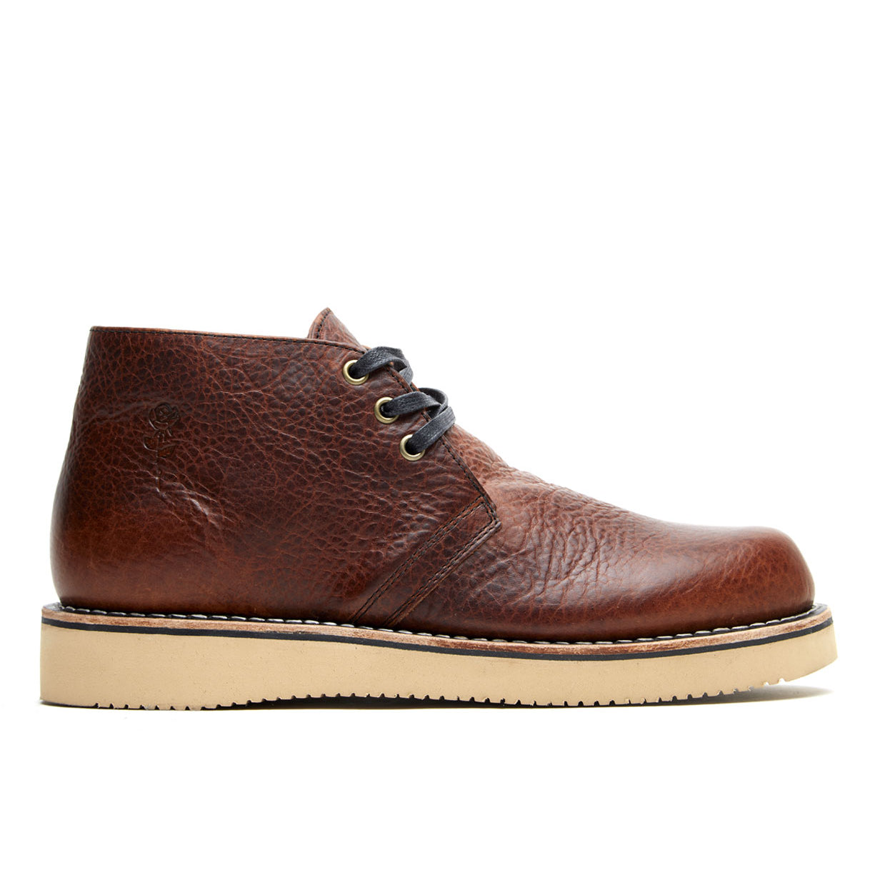 A single brown leather Santa Rosa Brand Union Cognac Bison Boot chukka with laces on a white background.