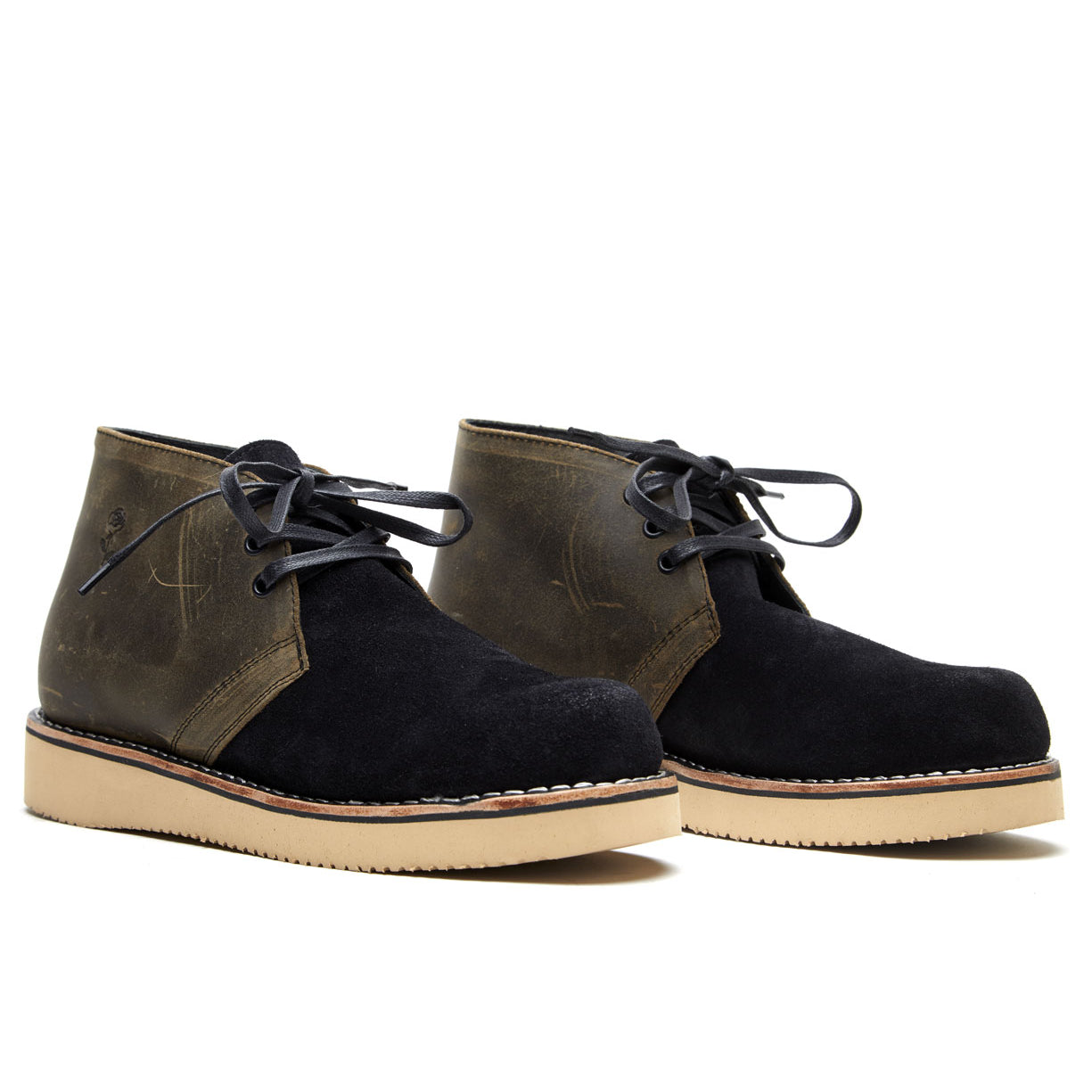 A pair of black suede Union chukka boots from the Santa Rosa Brand collection, featuring a Union boot design and goodyear welt construction, showcased on a white background.
