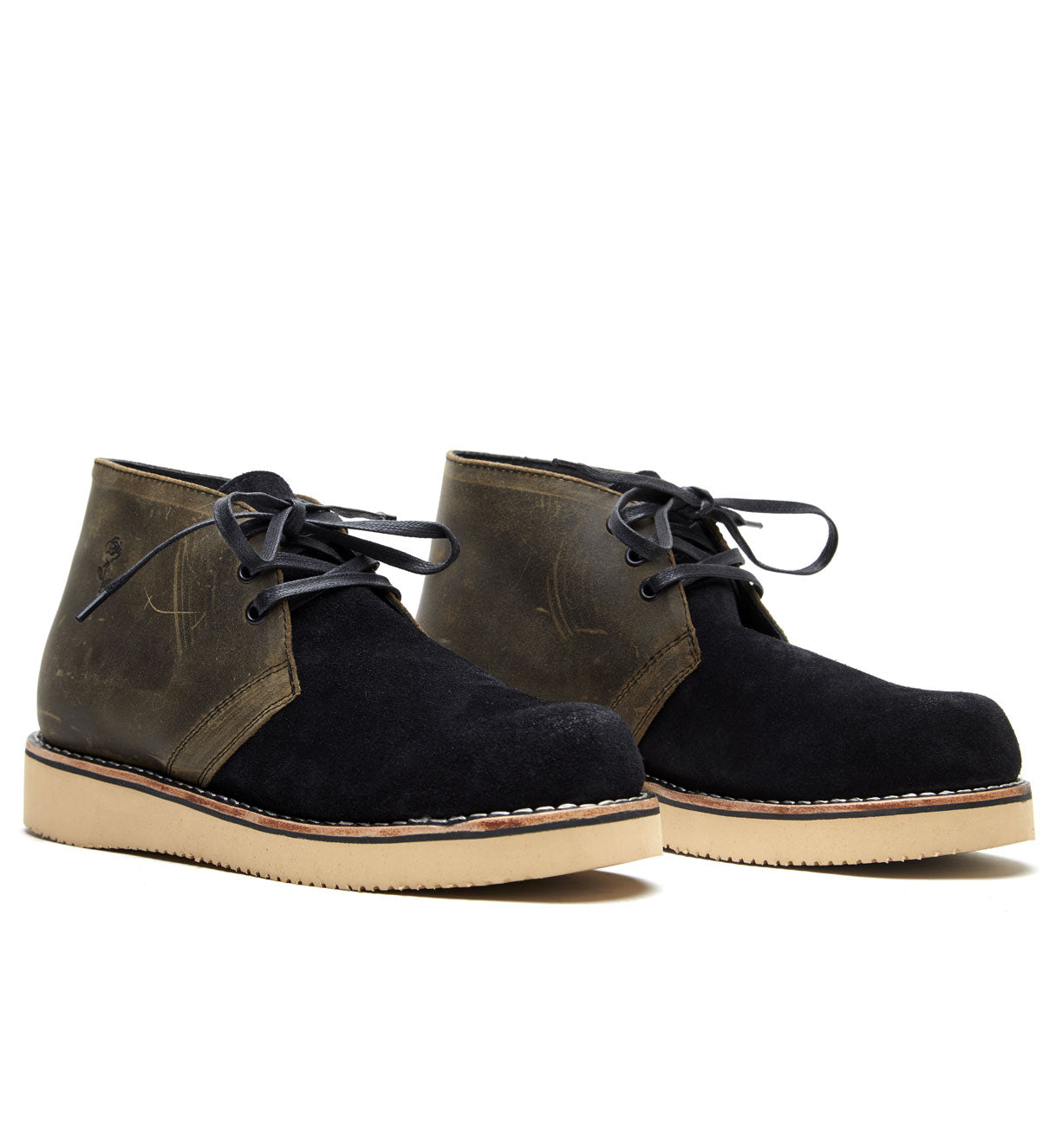 A pair of black suede Union chukka boots from the Santa Rosa Brand collection, featuring a Union boot design and goodyear welt construction, showcased on a white background.