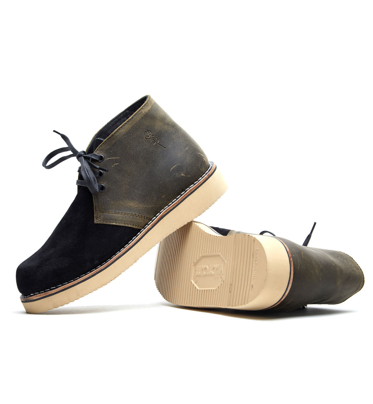 A pair of Union Boots with tan soles from the Santa Rosa Brand collection.